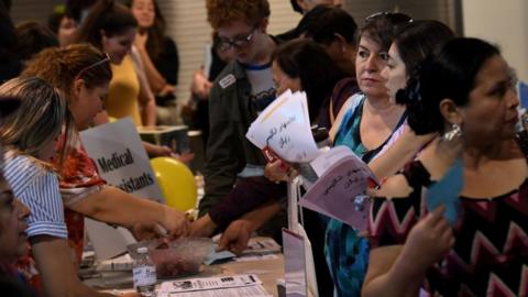 Refugees receive health advice at a free event in Glendale, California in 2017