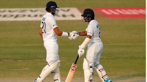 Wriddhiman Saha reqches his half century