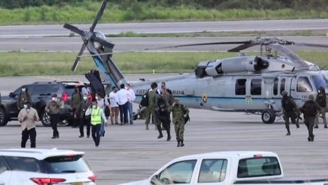 Images of presidential helicopter and Colombian president after 'attack' near Venezuela