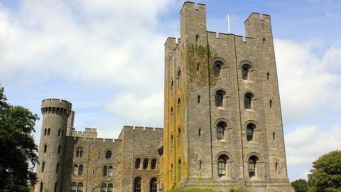 Penrhyn Castle against a blue sky