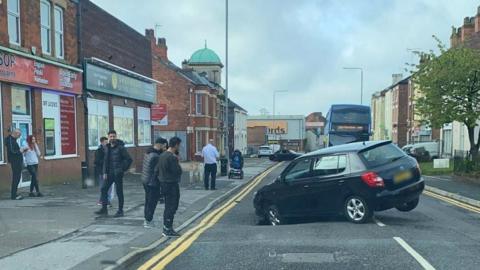 Car in sinkhole