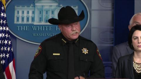 Sheriff speaking at podium
