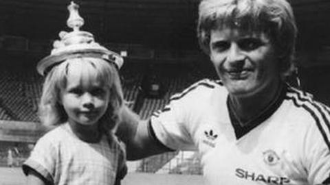 Gordon McQueen with Hayley as a child with the FA Cup