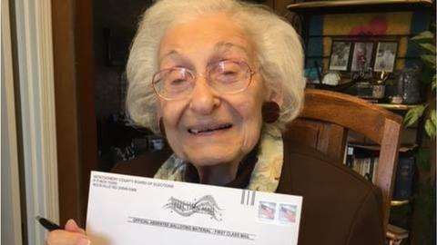 "Estelle L. Schultz, who was born two years before women had the right to vote, marked her absentee ballot for the first female president, Hillary Clinton."