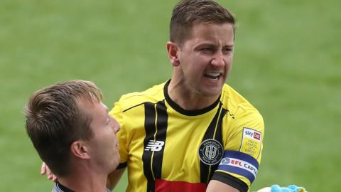 Harrogate Town captain Josh Falkingham scored the winning penalty against Tranmere Rovers