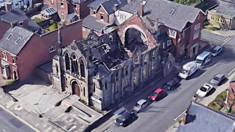 Google Earth view of the burned out church