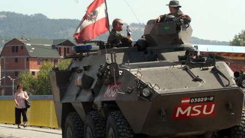 Austrian APC on patrol in Kosovo, Sept 2012 file pic