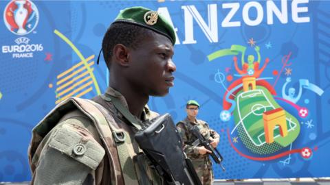 French soldiers patrol in front of the UEFA EURO 2016 fan zone in Nice, France