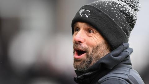 Derby County manager Paul Warne has a laugh on the sideline