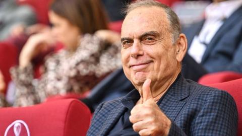 Avram Grant giving a thumbs up whilst watching football at the 2022 World Cup in Qatar