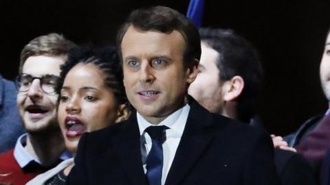 Emmanuel Macron celebrates with his wife Brigitte Trogneux on Sunday 7 May