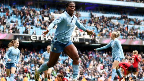Manchester City's Khadija Shaw celebrates scoring against Manchester United in the Women's Super League