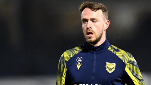 Oxford United defender Sam Long signs a new three-year contract to stay at the club.