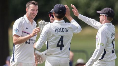 Toby Roland-Jones takes a wicket