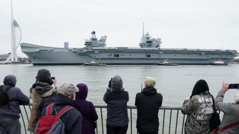 Aircraft carrier arriving back in Portsmouth