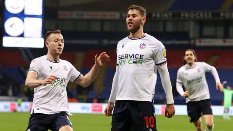 Bolton's Dion Charles celebrates his equaliser