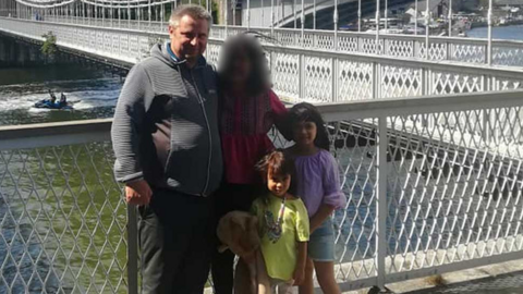 Bartlomiej Kuczynski, 45, a woman, 12-year-old-Jasmin Kuczynska, and Natasha Kuczynska, aged nine, near a river bridge