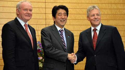 Martin McGuinness, Shinzo Abe and Peter Robinson in Tokyo in December 2013