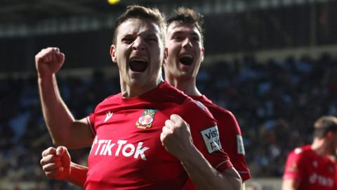 Wrexham striker Paul Mullin celebrates at Coventry City