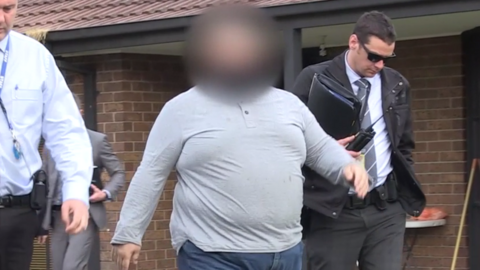 Police arrest a Melbourne man alleged to have sent money to an Islamic State group fighter overseas