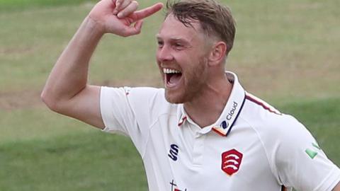 Jamie Porter celebrates a wicket