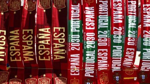 Scarves showing Spain and Portugal's intention to make a joint-bid to host the 2030 World Cup