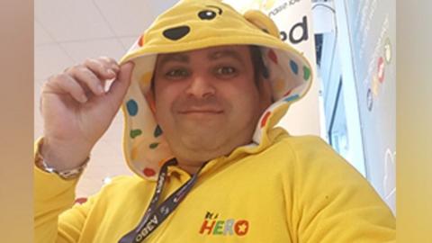 David Levi dressed in a fake Pudsey Bear costume