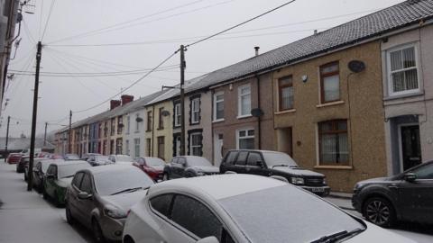 Snow covered cars in Tonypandy, Rhondda Cynon Taff