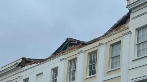 Two Regency properties in Cheltenham with missing roof