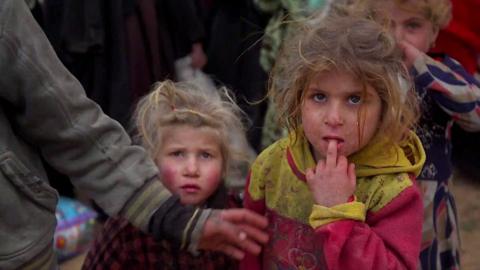 Two children among the people leaving IS's final stronghold in Syria