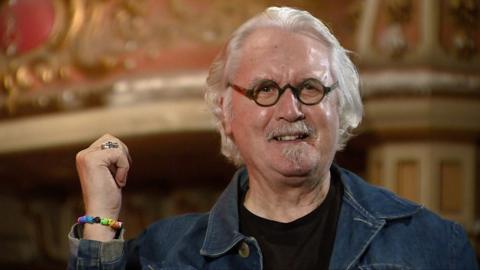 Billy Connolly on stage for an interview