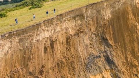 People on cliff edge after landslip