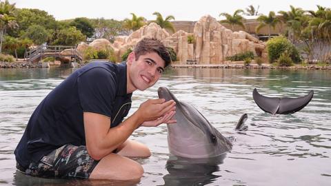 SeaWorld worker with fish