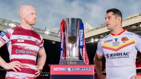 Wigan captain Liam Farrell and Catalans captain Ben Garcia stand aside the Super League trophy