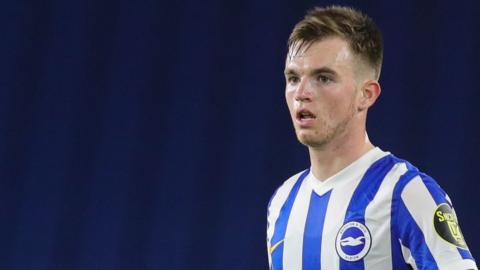 Marc Leonard in action for Brighton in the EFL Cup