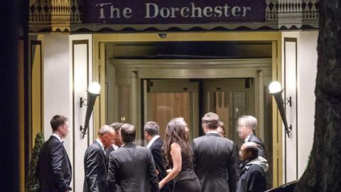 Guests outside the Dorchester hotel