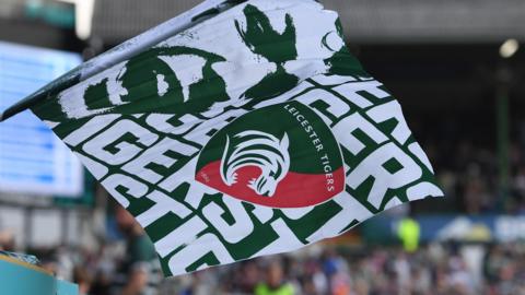 Leicester Tigers flag being waved by a fan