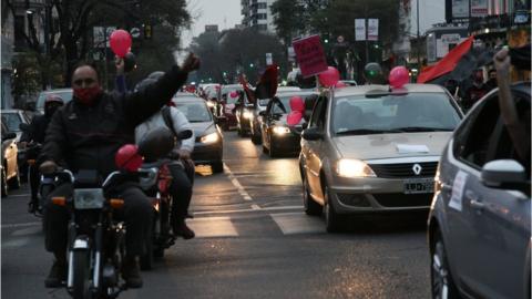 Newell's Old Boys fans parade to bring Messi home