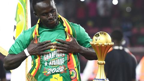 Sadio Mane with the Africa Cup of Nations trophy