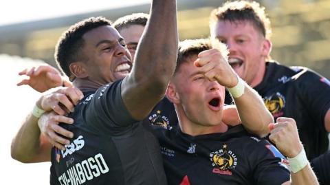 Exeter celebrate a try