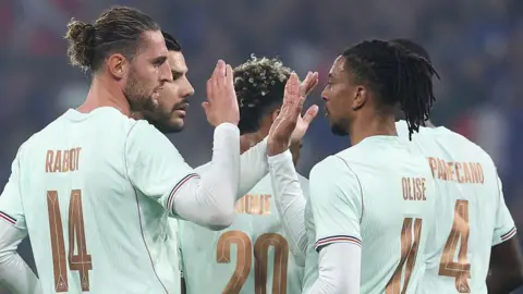 France celebrate their opening goal