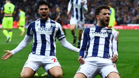 West Brom goalscorer Mikey Johnston slides on his knees alongside team-mate Alex Mowatt