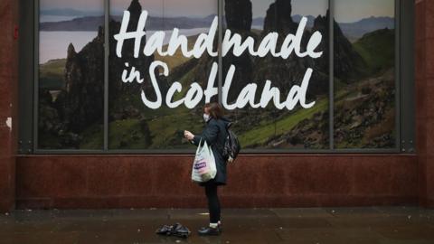 Woman in mask in Scotland