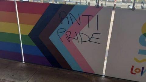 One of the defaced Pride banners