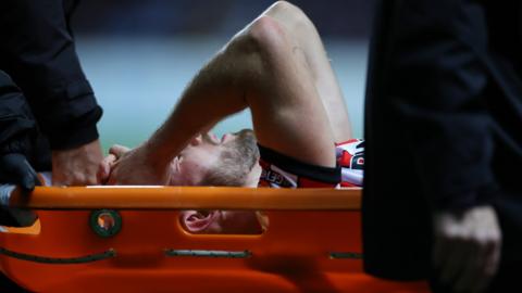 Rhys Norrington-Davies is stretchered off for Sheffield United at Coventry