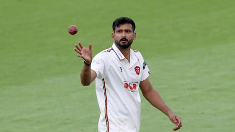 Khaleel Ahmed catching the ball for Essex