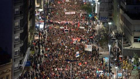 People march against a project that proposes security measures to be voted in a referendum during Sunday's general election, in Montevideo