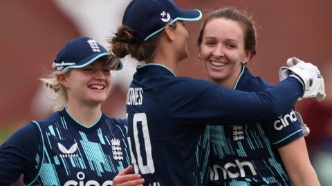 England celebrating a wicket