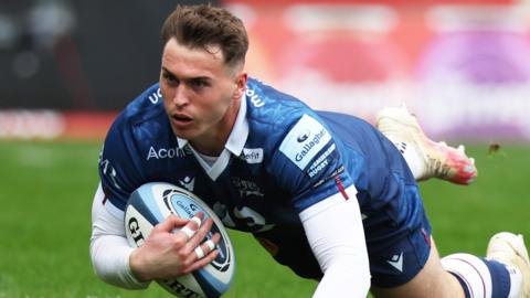 Tom Roebuck scores Sale's first try against Newcastle Falcons at the AJ Bell Stadium