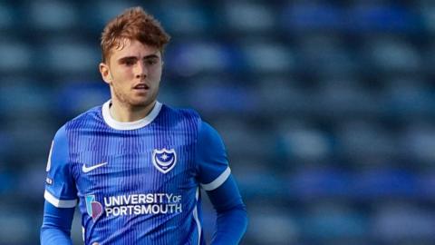 Portsmouth defender Zak Swanson in action during a League One match in the 2023-24 season